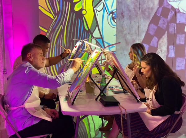 Four people painting.png