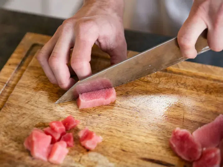 fresh-poke-bowl-houston-cutting-fish.png