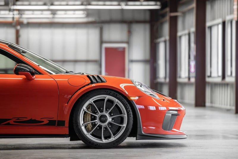 front-of-orange-porsche