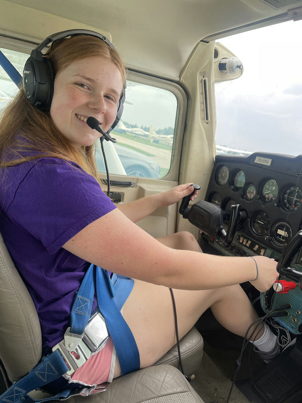 plane parked on sunny day