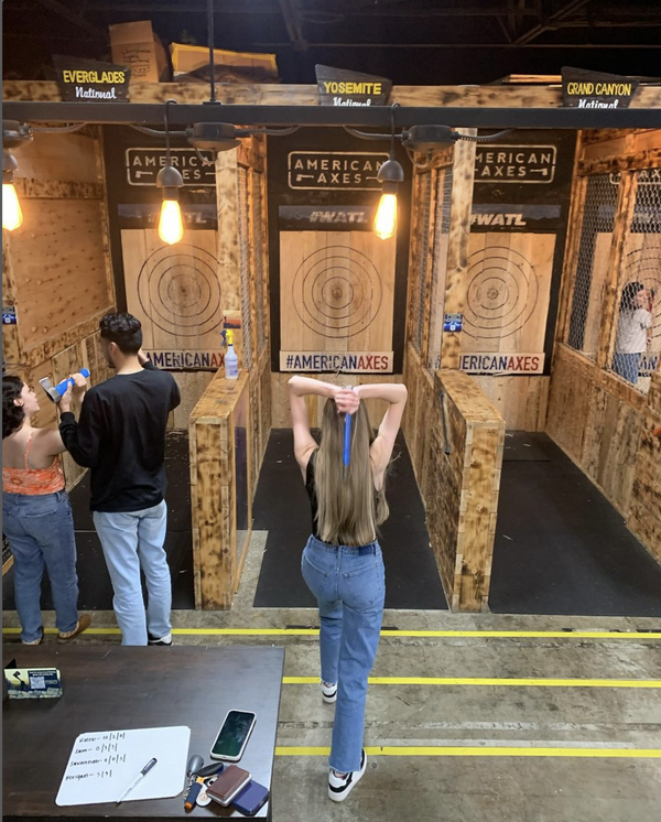 girl-throwing-axe