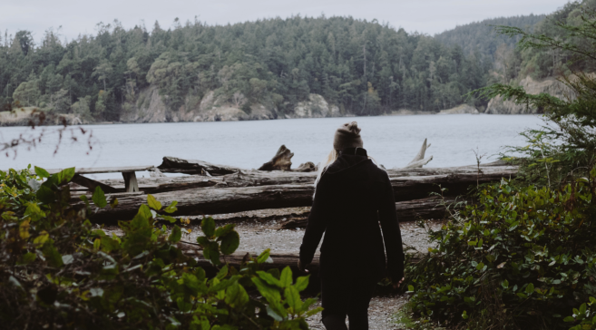 girl-walking-towards-water