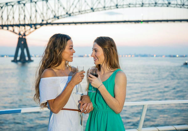girls holding hands on cruise