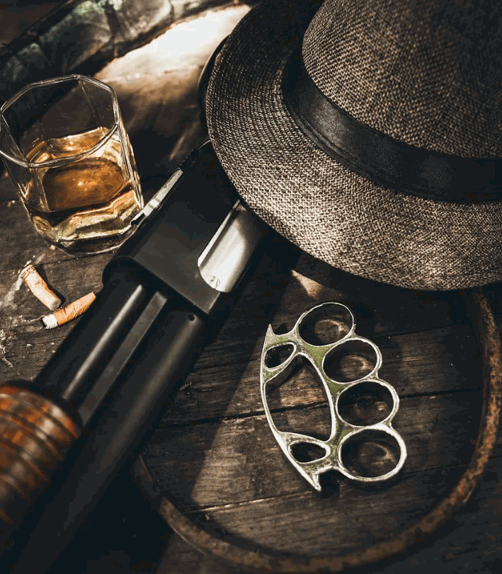 glass-of-whiskey-cigaretts-and-a-hat