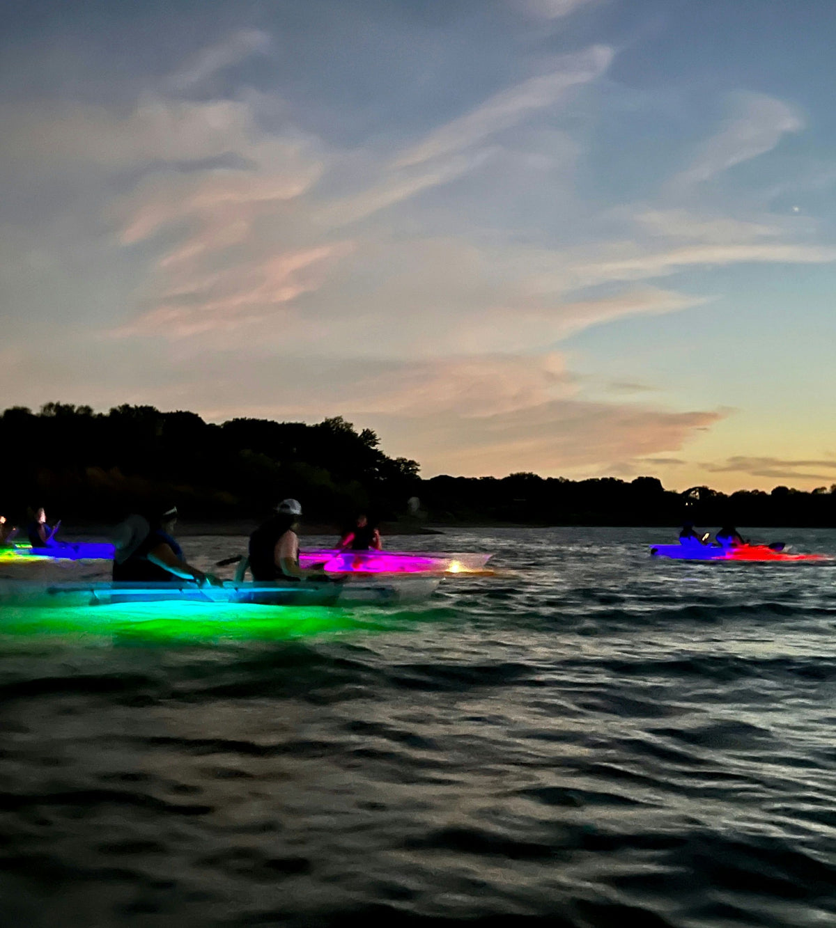 grapevine-lake-sunset-glow-clear-kayak-tour-group-glowing-on-water-jpg