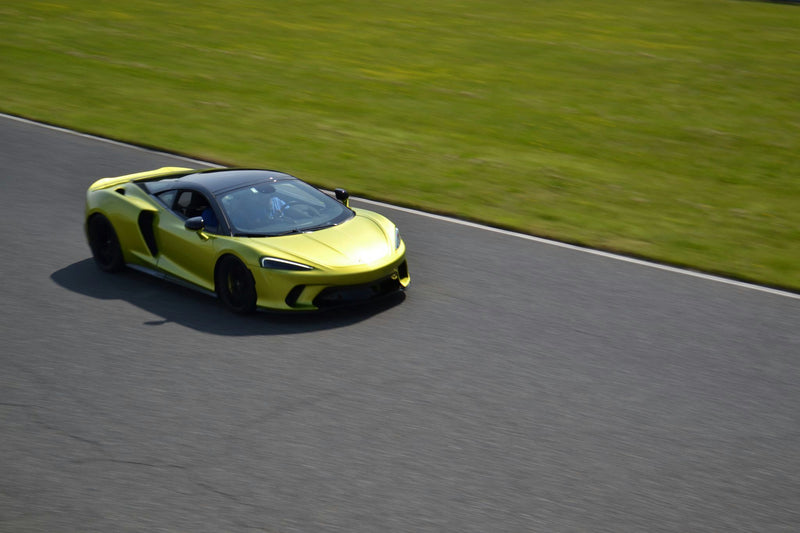 green sports car racing