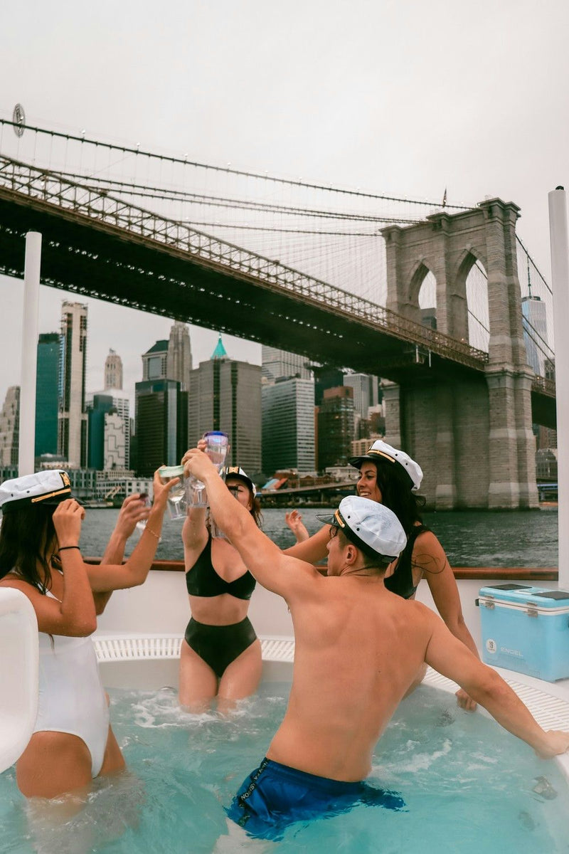 group-cheers-in-hot-tub