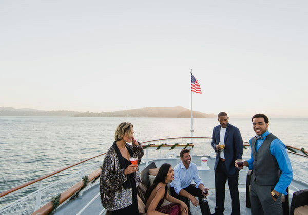 group enjoying boat