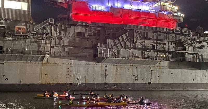 group-kayaking-at-night
