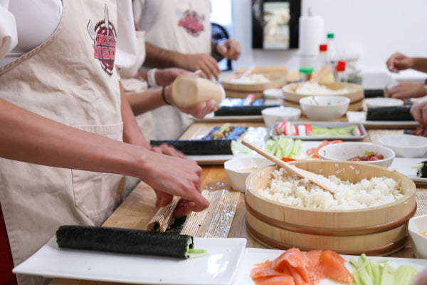 group making sushi