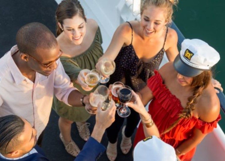 group-of-friends-toasting-on-sights-and-sip-tour