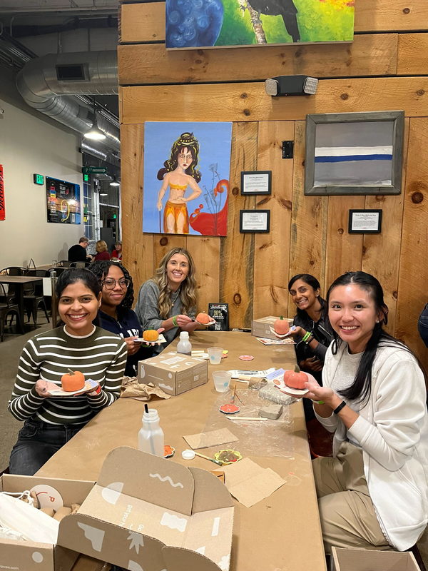 group of girls making pottery