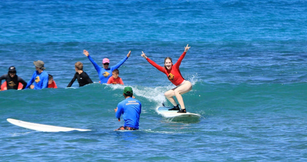 group of happy surfers hawaii.jpg