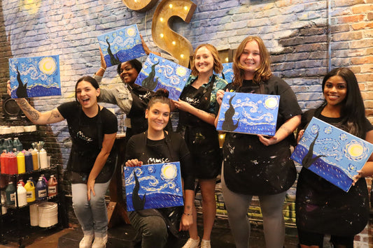 group of women with starry night painting