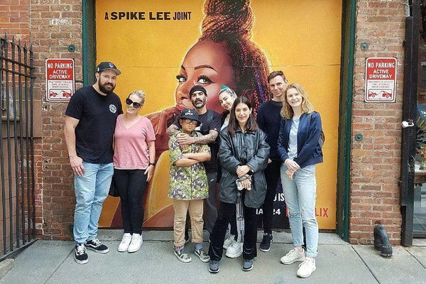 group photo with street art