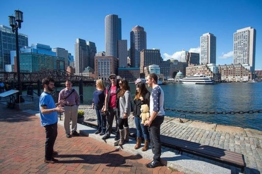 group with boston skyline