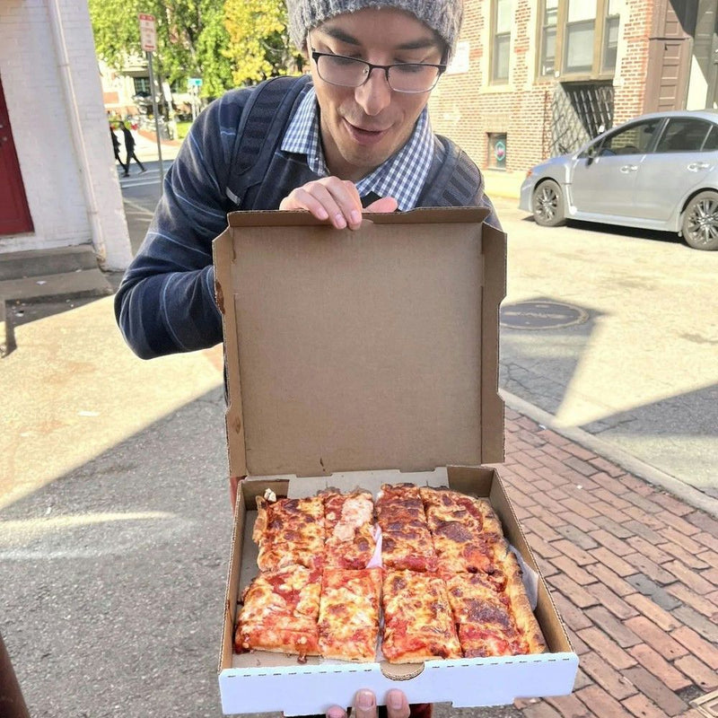 guide holding pizza box