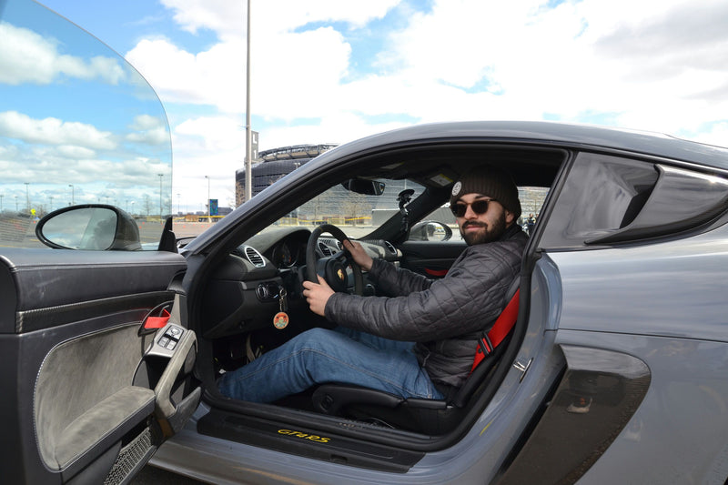guy driving super car
