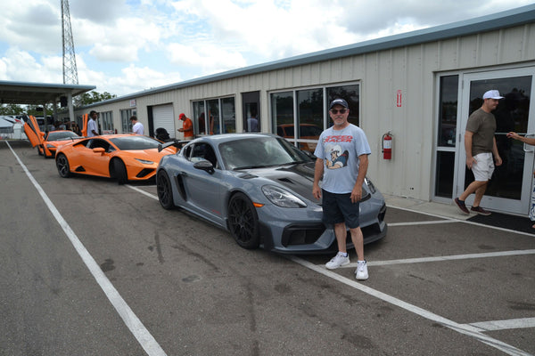 guy-with-several-sports-car