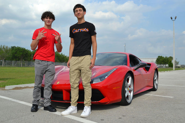 couple and sports car