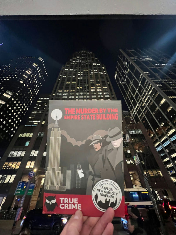 nyc hand holding booklet