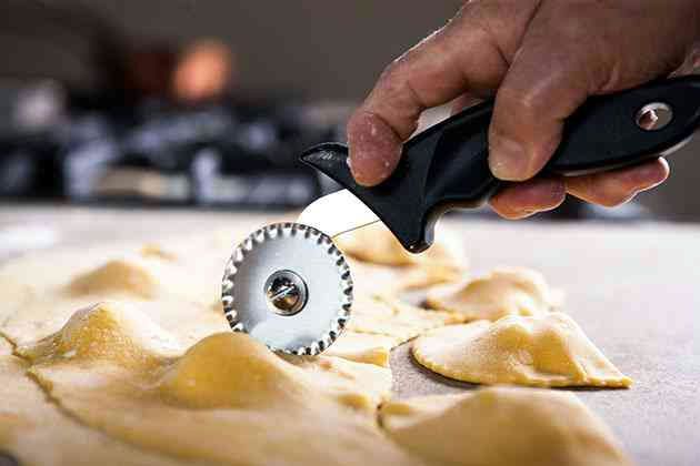 rolling out Handmade Ricotta Ravioljpeg