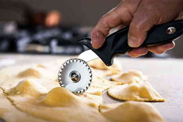 Handmade Ricotta Ravioli cutting 6.jpeg
