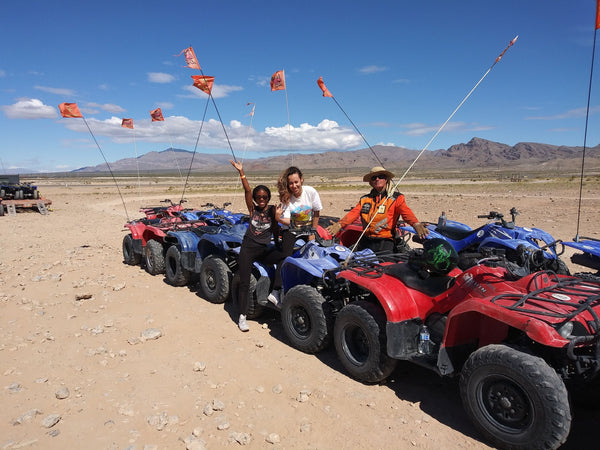 happy people with ATVs