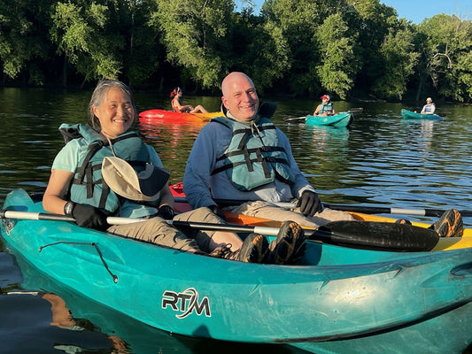 happy couple kayaking