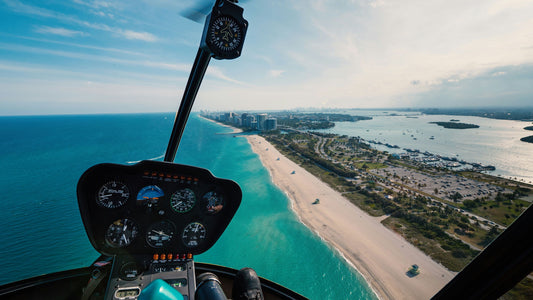 helicopter over florida beach at sunset