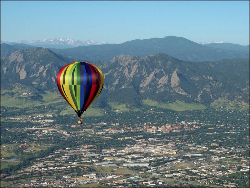 Hot air balloon with mountain backdrop