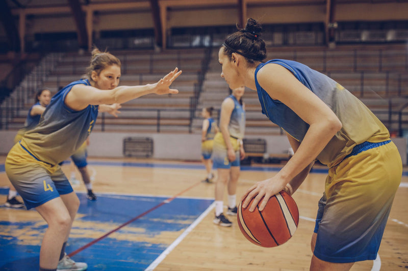 women playing basketball
