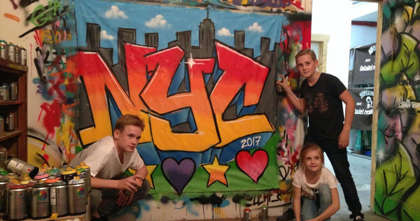 kids spray painting.jpg