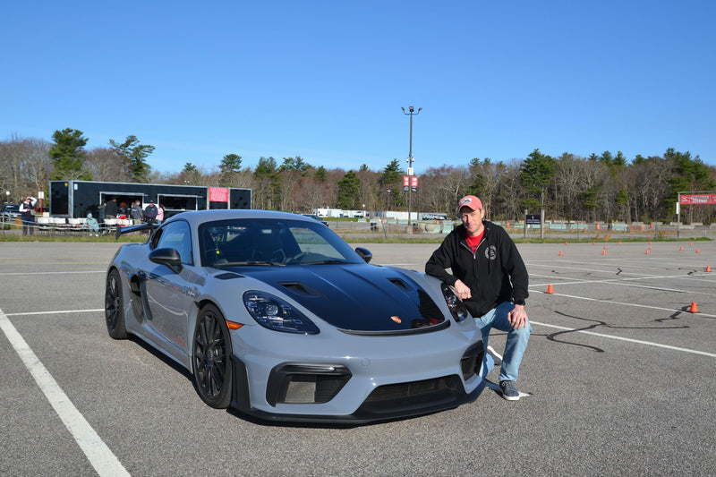 kneeling with car