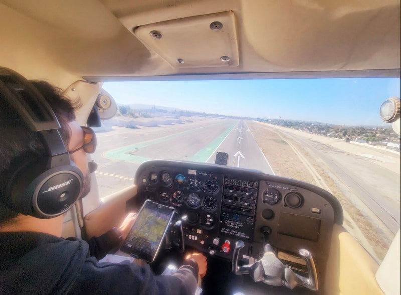 Landing airplane on runway