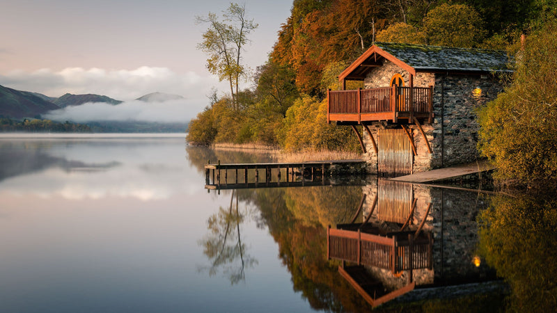 landscape of house over calm lake