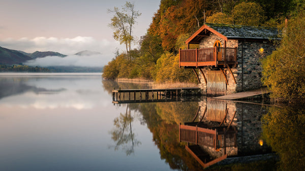 landscape of house over calm lake