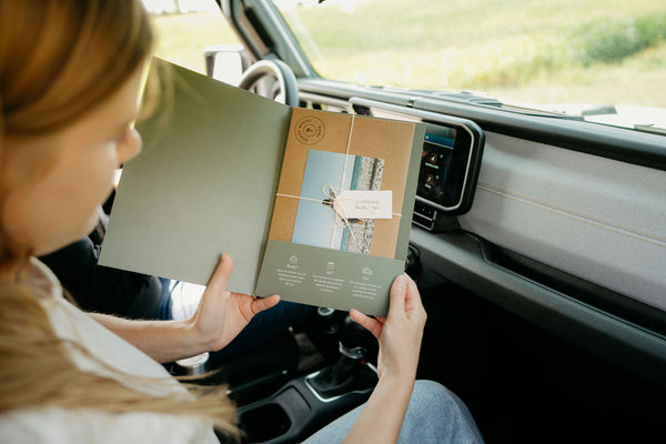 looking in awe at clue book