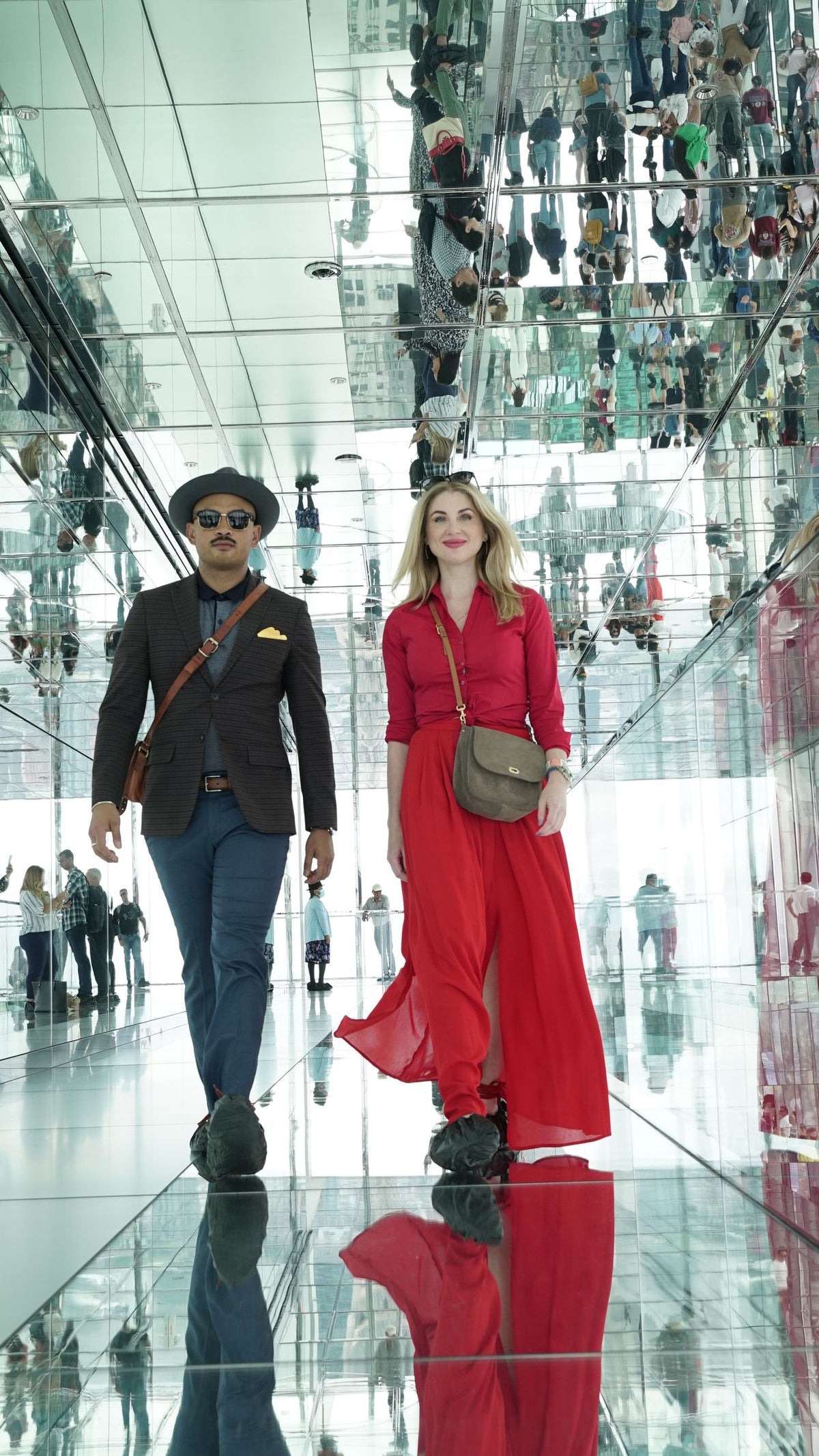 man-and-woman-walking-in-cool-room