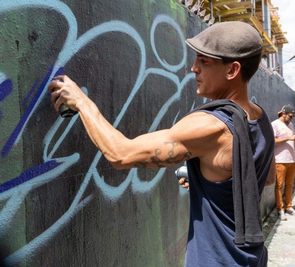 man-creating-street-art