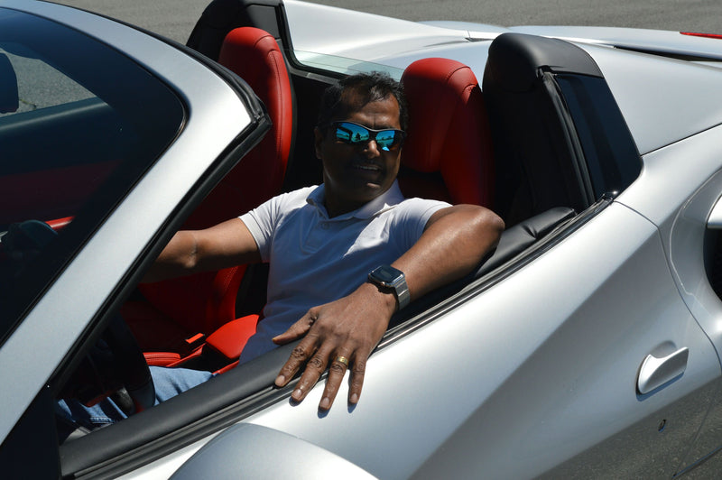 man driving convertible