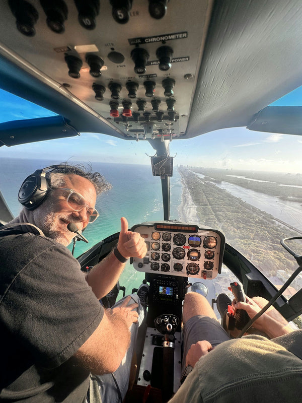 man flying helicopter