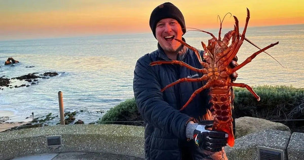 man holding agiant lobster.jpg