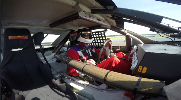 man-inside-stock-car-about-to-drive