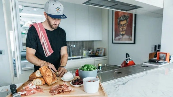 man making a sandwich