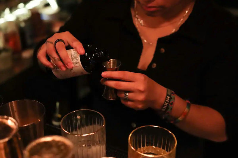 man-making-drinks