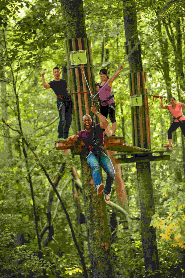 man really having a blast zip lining