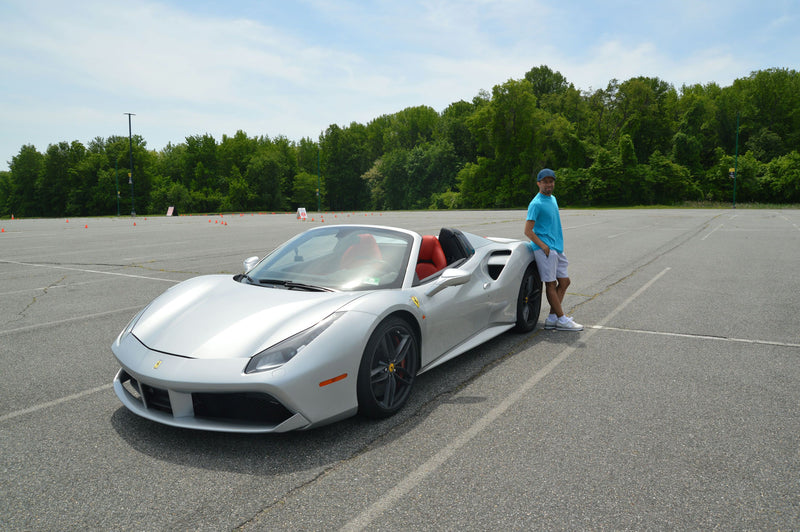 man with white convertible