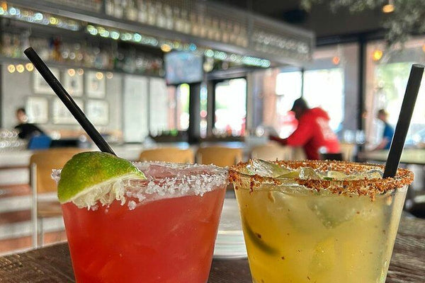 woman carrying burger on tray
