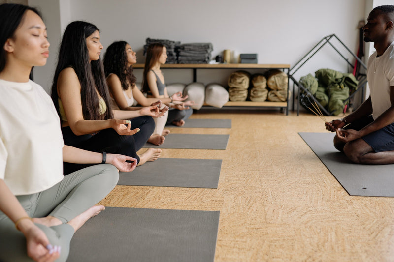 meditating in yoga class
